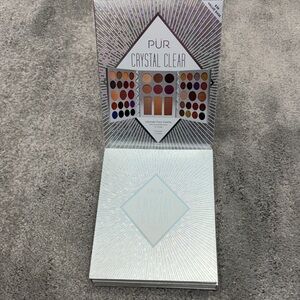 Crystal Clear Eyeshadow Palette with Rich Browns and Shimmering Silvers